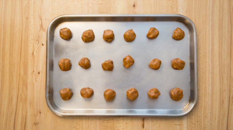 cookie dough balls on pan