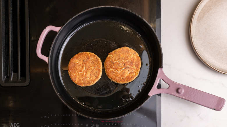 tuna patties browning in pan