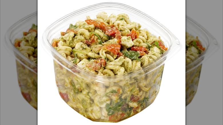 A container of Costco's Pesto Pasta Salad