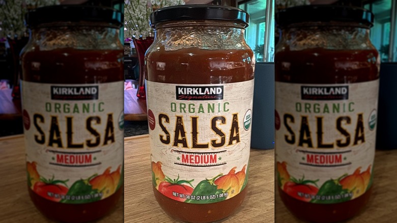Jar of Kirkland Signature Organic Salsa on wooden table
