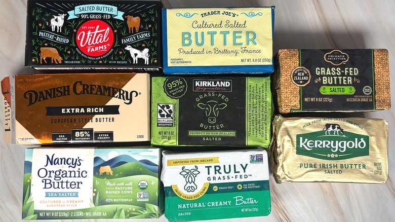 Variety of European-style butters in packaging on table