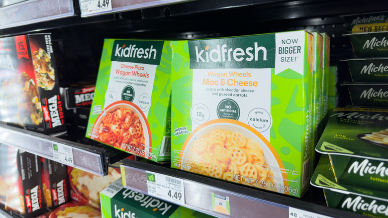 Two boxes of Kidfresh frozen meals displayed in grocery store freezer aisle