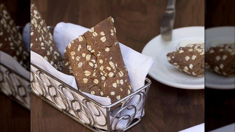 Brown bread in a basket on a table