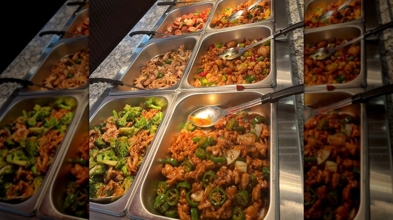 Trays filled with Asian dishes at Lin's Grand Buffet