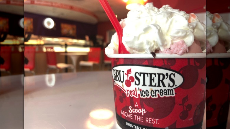 Bruster's sundae topped with whipped cream in ice cream parlor