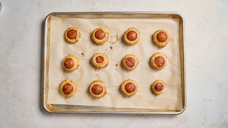 baking puff pastry bites on a sheet tray