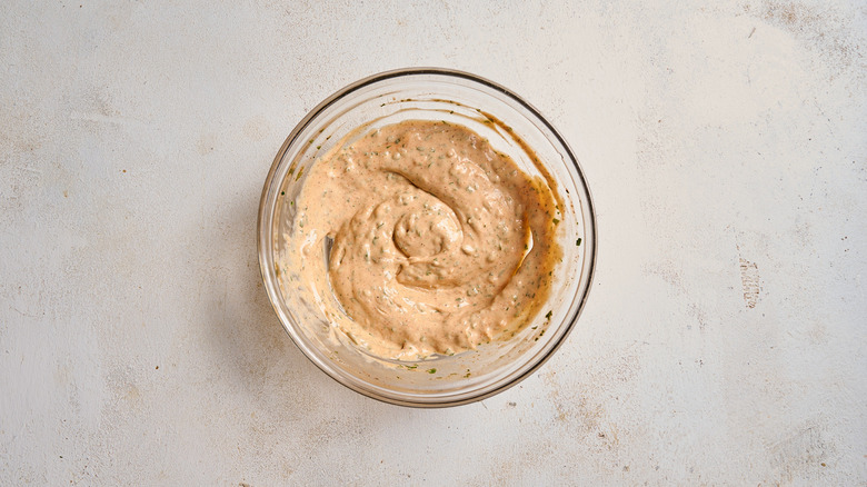 mixing remoulade in a bowl