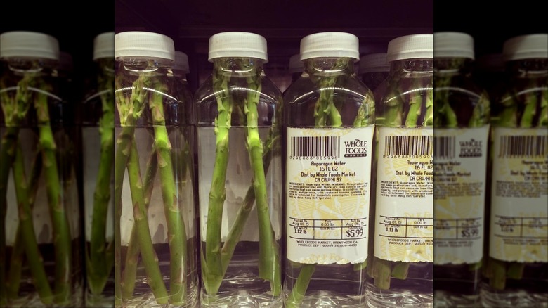 Bottles of Whole Foods asparagus water