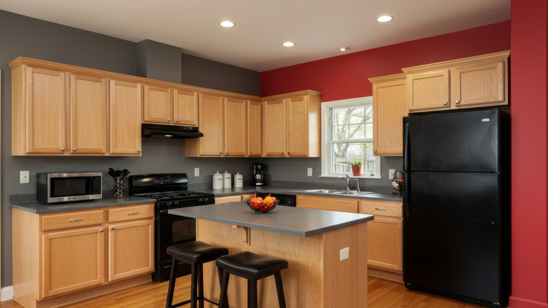 A kitchen painted gray and red