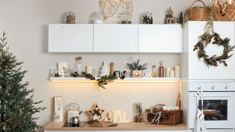 Holiday decor on kitchen cabinets and shelves