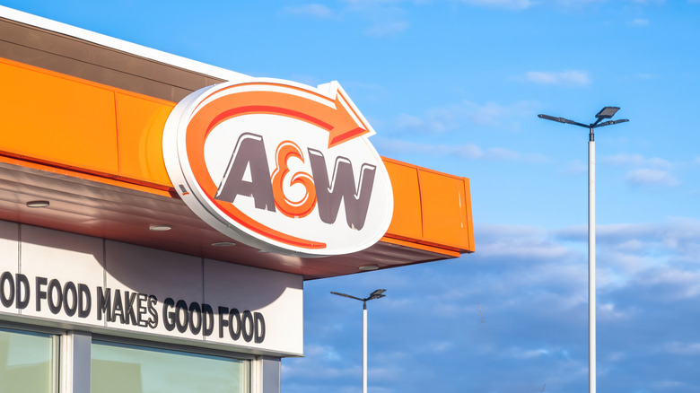 A&W restaurant front against bright blue sky
