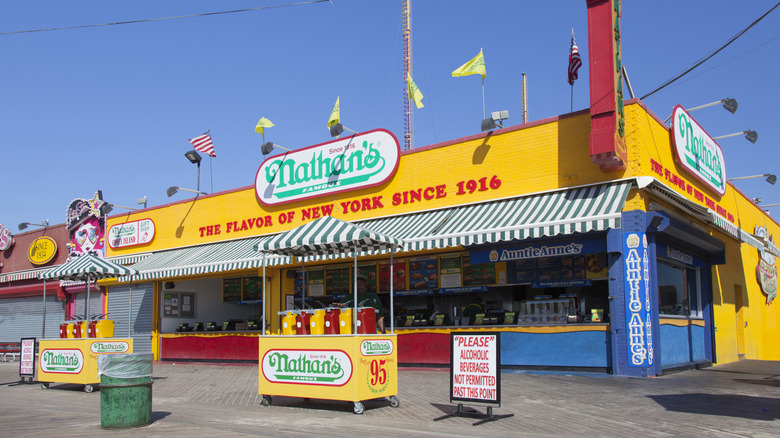 Nathan's famous restaurant in bright colors on Coney Island on sunny morning