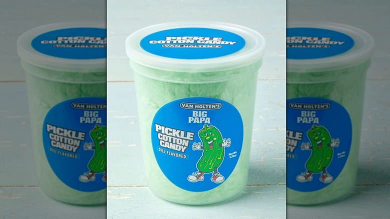 Tub of Van Holten's Big Papa Cotton Candy on wooden table, mirrored image