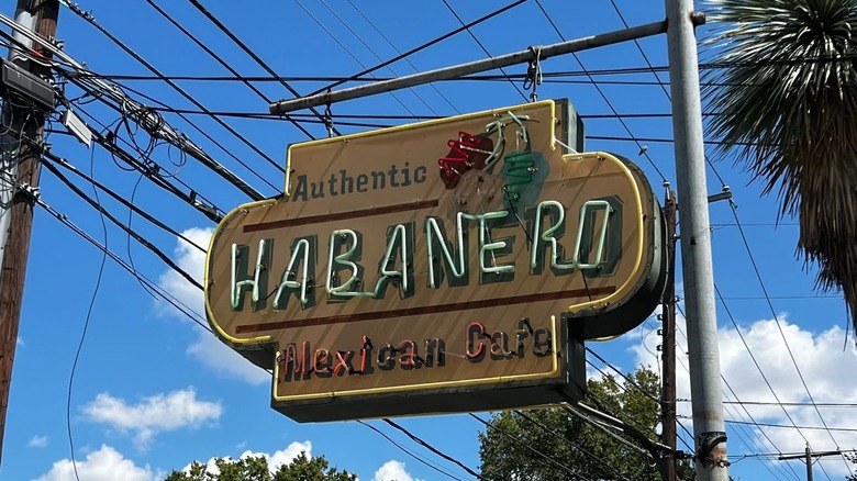 Neon restaurant sign with Habanero Mexican Grill