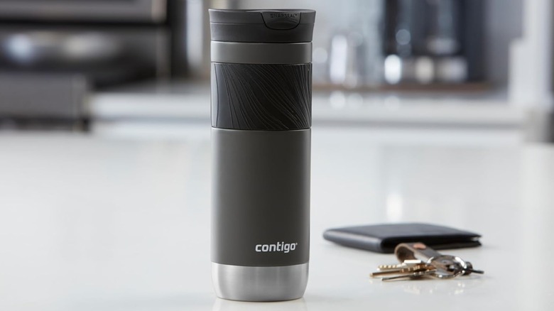 Contigo Byron Travel Mug on a counter next to keys and a wallet