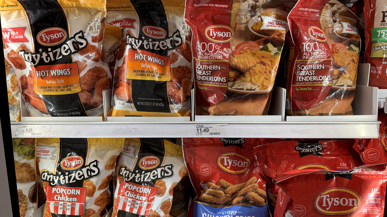 Freezer section of store with various Tyson frozen chicken products