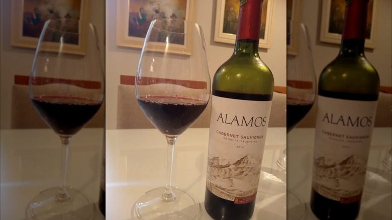 bottle and glass of Alamos Cabernet Sauvignon wine