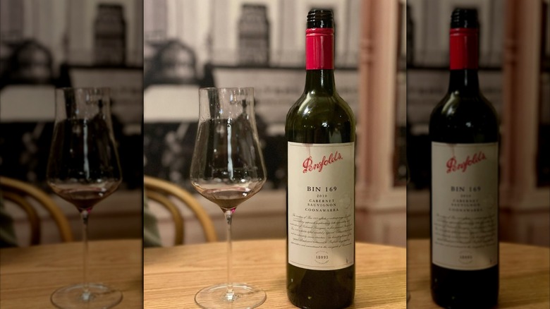 bottle and glass of red wine