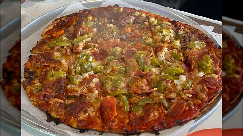 Tavern-style pizza with peppers and pepperoni