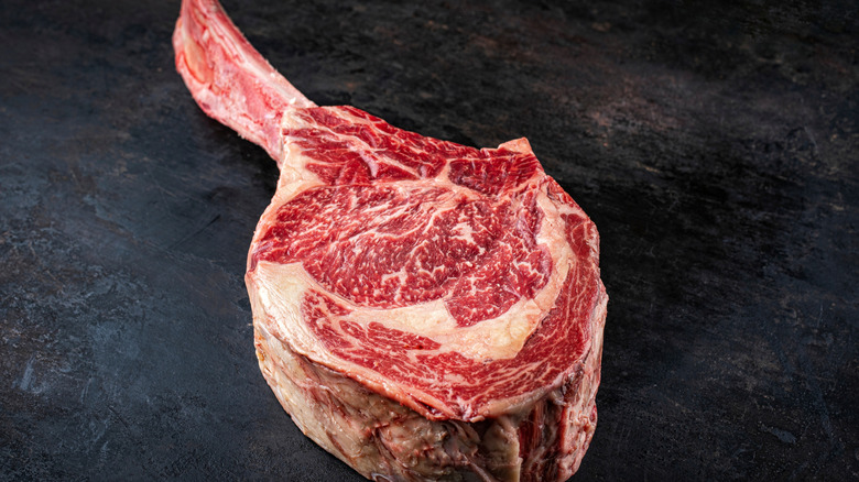 A well-marbled Wagyu tomahawk steak