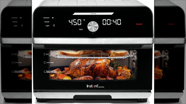Instant Omni Plus Air Fryer Toaster Oven on white background