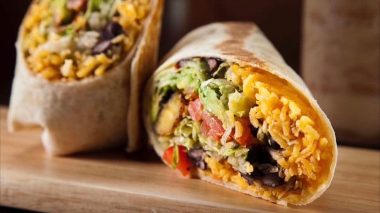 Veggie burrito cut in half