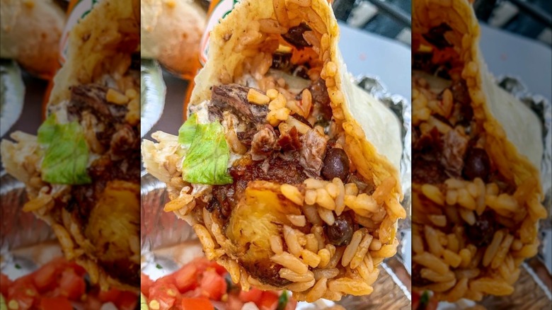 Inside of a burrito with rice and beans