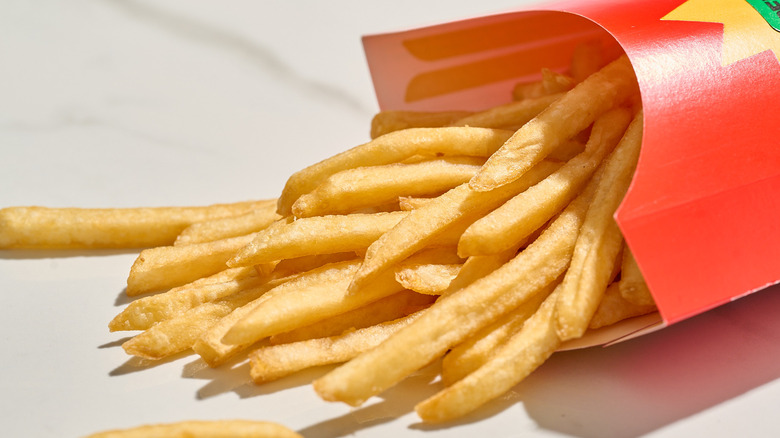 McDonald's french fries spilling out of their box