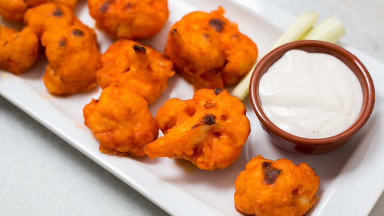 cauliflower wings served on dish