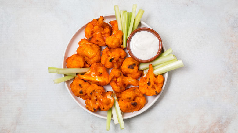 Buffalo cauliflower served on table