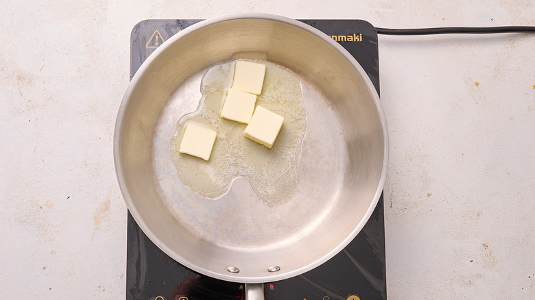 melting butter in a skillet