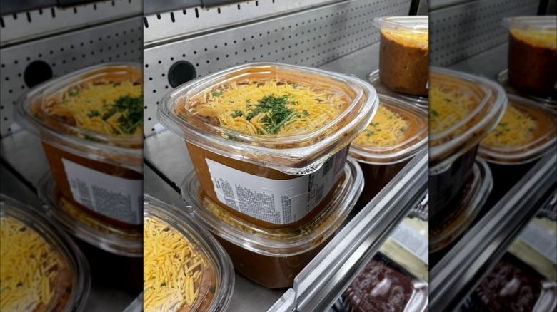 Containers of Costco's beef chili in the refrigerated section of the store