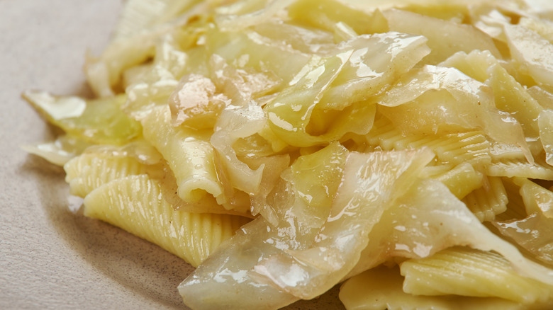 closeup image of a dish of cabbage and noodles, aka haluski