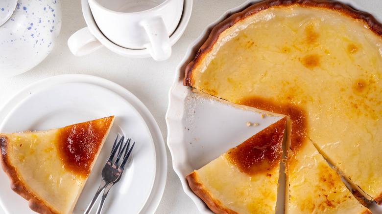 A Depression-era "water pie," in a white pie plate, with one wedge removed and served on a white side plate