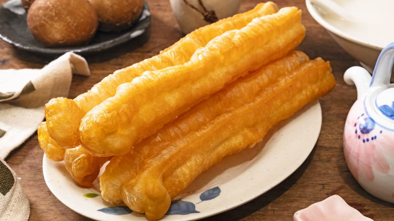 A plate of youtiao donuts