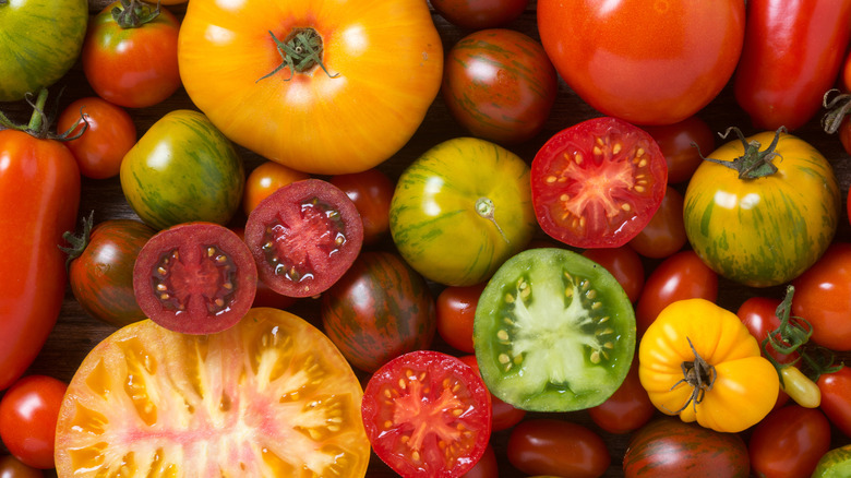 a close-up of various kinds of heirloom tomatoes