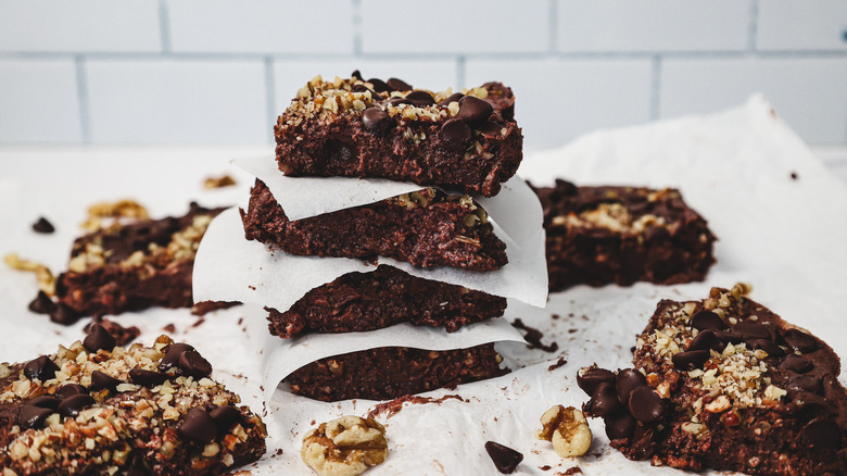 Stack of high protein brownies on a table