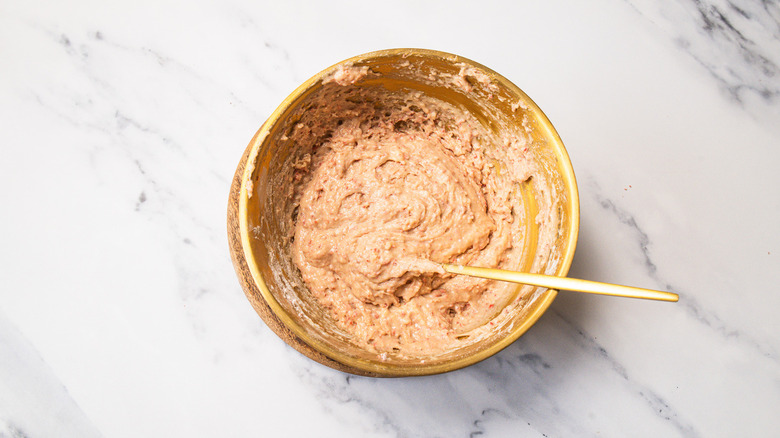 Batter in a bowl with fork.