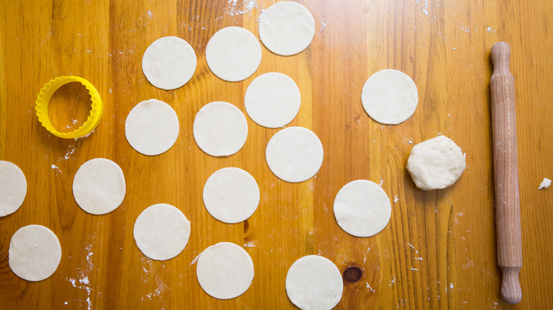 small dough circles on table