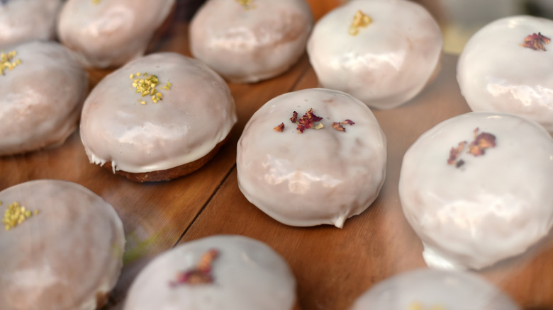 glazed donuts placed on table