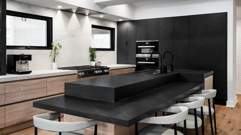 Scandinavian-style black, white, and wood kitchen
