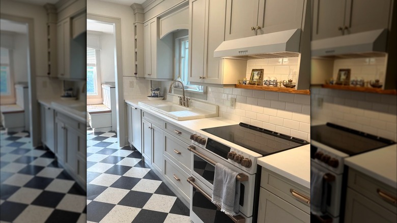 Modernist retro kitchen with black and white checkered flooring