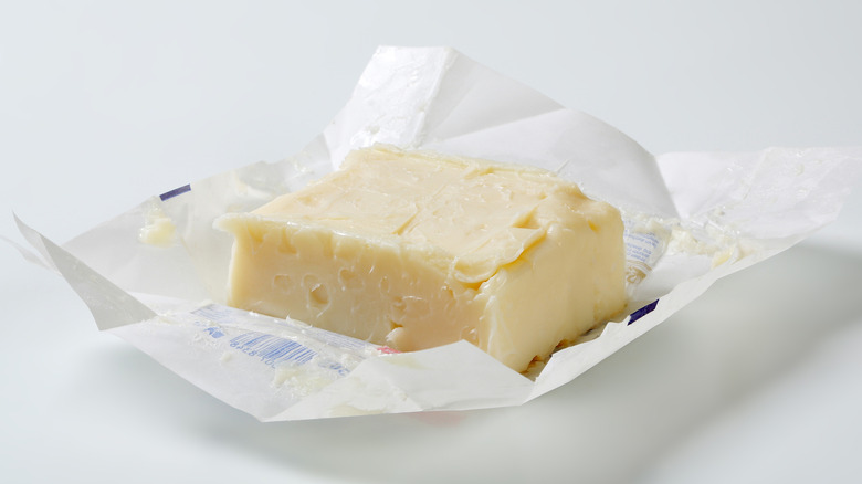 Block of lard in a paper wrapper