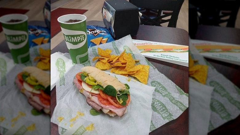 Blimpie sub with chips and a drink