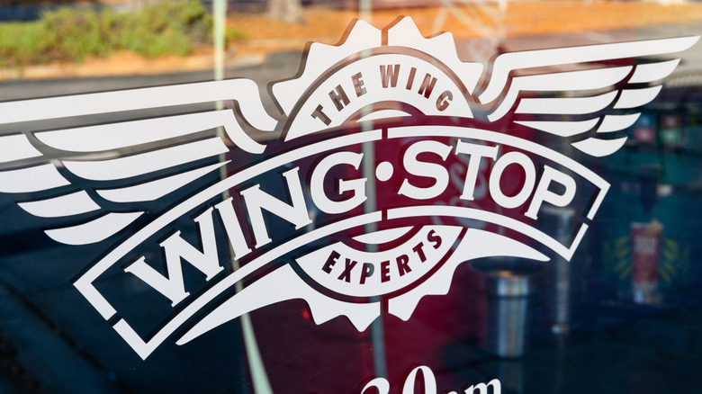 Wingstop logo printed on glass window