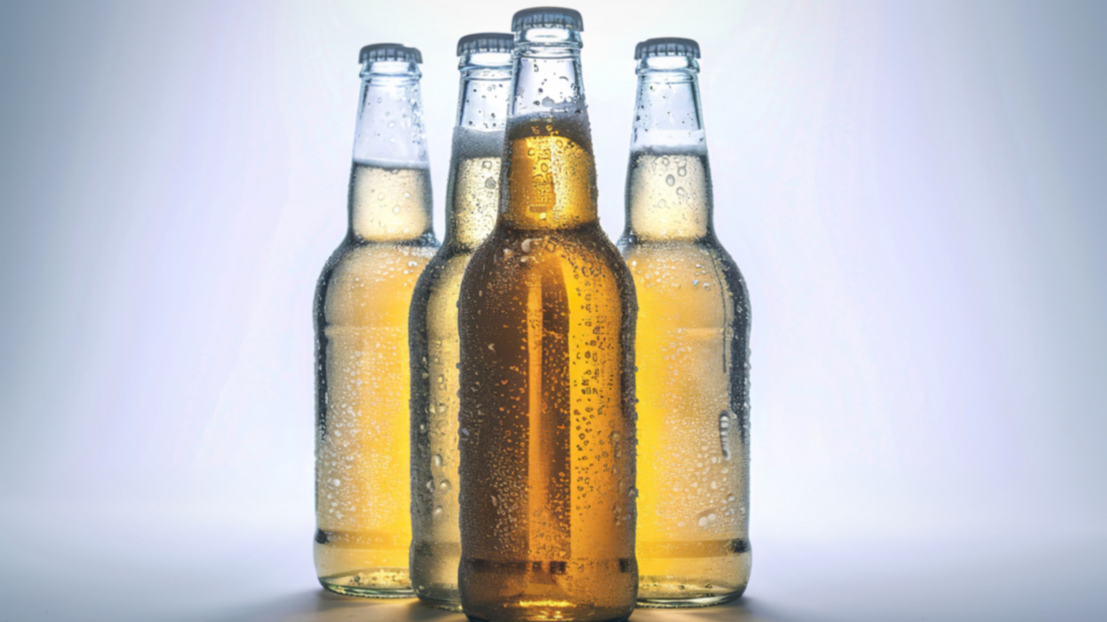 Think Twice Before Drinking Beer Out Of A Clear Bottle. Here's Why - Tasting Table