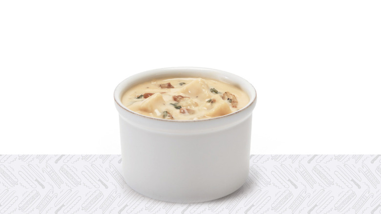 Paper cup of Firehouse Subs loaded potato soup