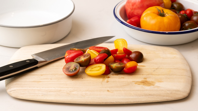 tomatoes on a chopping board
