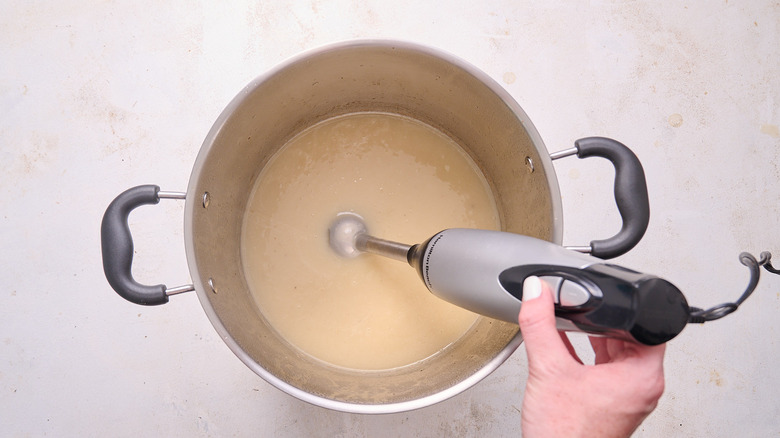 blending potatoes with immersion blender
