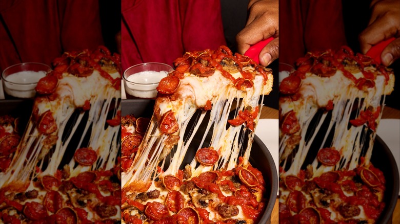 deep dish pizza being served